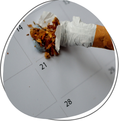 Cigarette put out on a calendar